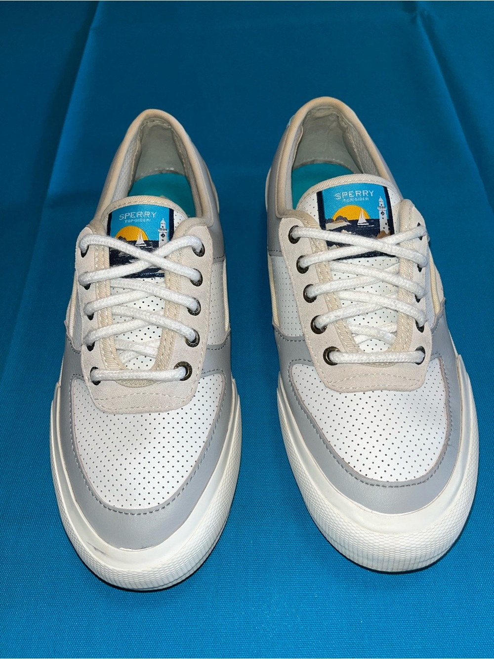 Sperry White and Light Gray Perforated Leather Sneakers with Blue Tongue Accent
